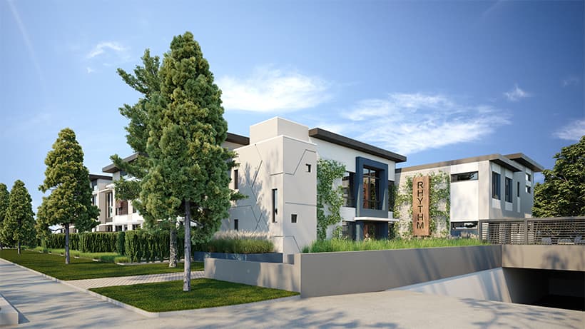 Rendering of Rhythm Living townhouses on a clear day with trees out front